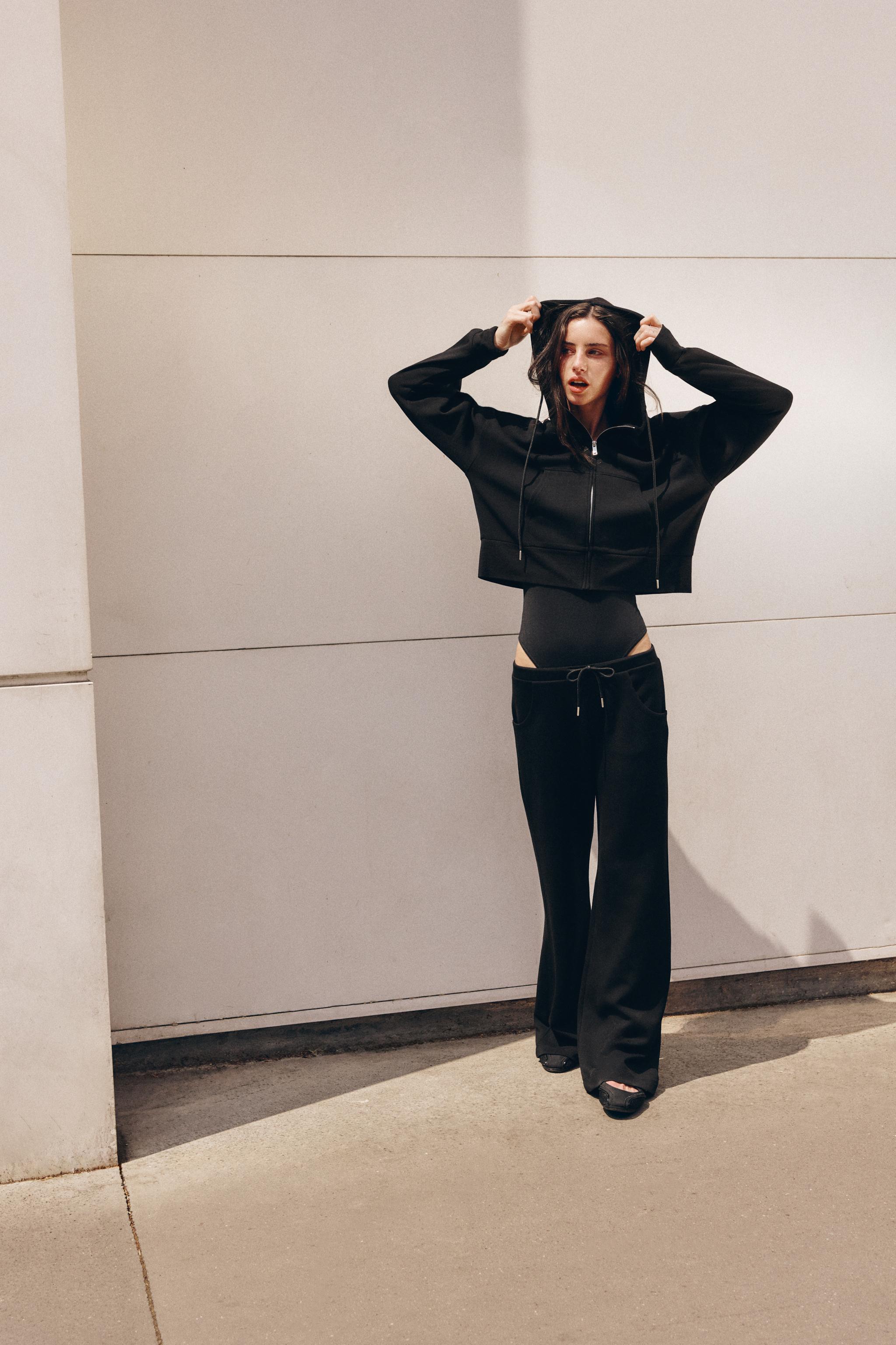 INTERLOCK FLARED PANTS